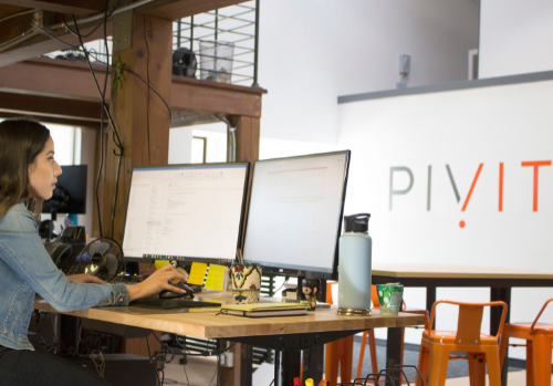 pivit employee working at desk in santa barbara office